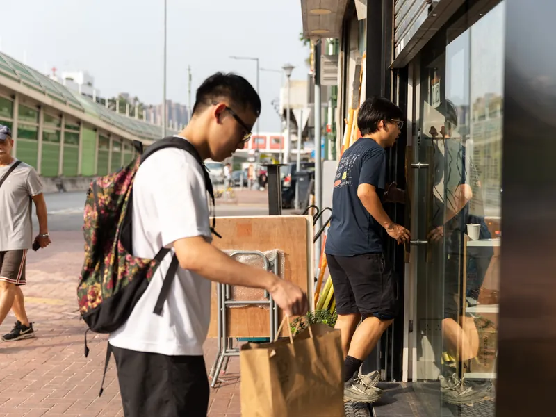 A food waste handover at a shop